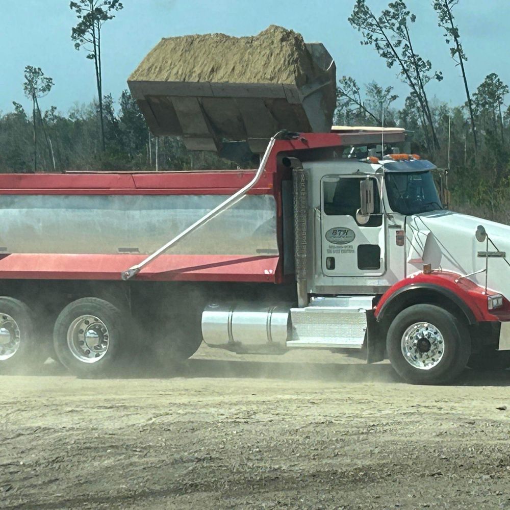 Hauling for Between The Hedges Landscape & Trucking LLC in Altha, FL