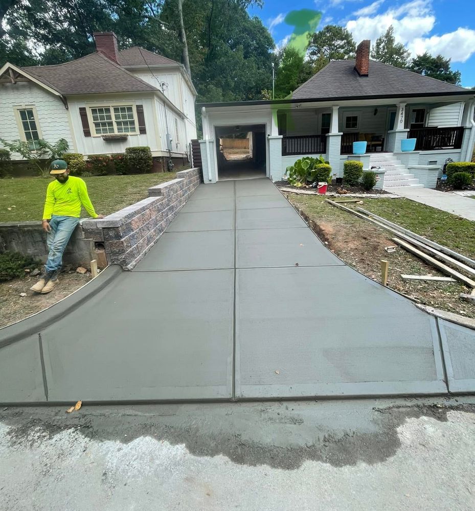 Our Concrete Driveway service offers durable, aesthetically pleasing solutions for your home. Discover what is concrete and how it enhances curb appeal with expert installation ensuring long-lasting, low-maintenance driveways. for Creative Remodeling & Plus in Lilburn, GA
