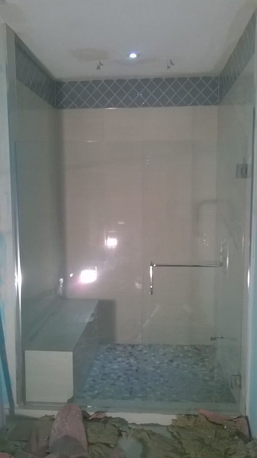 Our Semi-Frameless Shower Doors offer a sleek, modern look combined with durable materials, providing homeowners an affordable solution that adds elegance and functionality to their bathroom without compromising on quality or design. for Pristine Showers in Acworth, GA