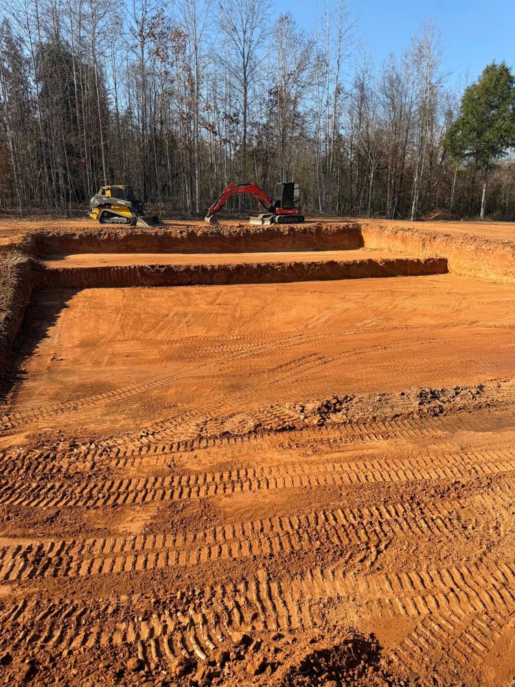 Our professional excavating contractor team specializes in precise and efficient excavation services, ensuring safe site preparation for your home projects while minimizing disruption and maximizing satisfaction. for Kelley Excavation & Land Services in Anderson, SC