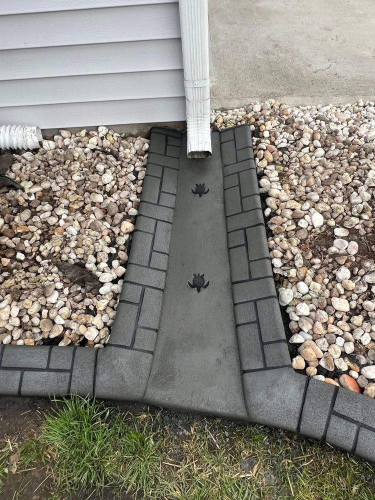 Enhance your landscape with our Drainage Installation add-on, ensuring efficient water management while preserving the beauty of your curbing and borders. Protect your investment with seamless integration into your outdoor space. for Curbology in Lakeland, FL