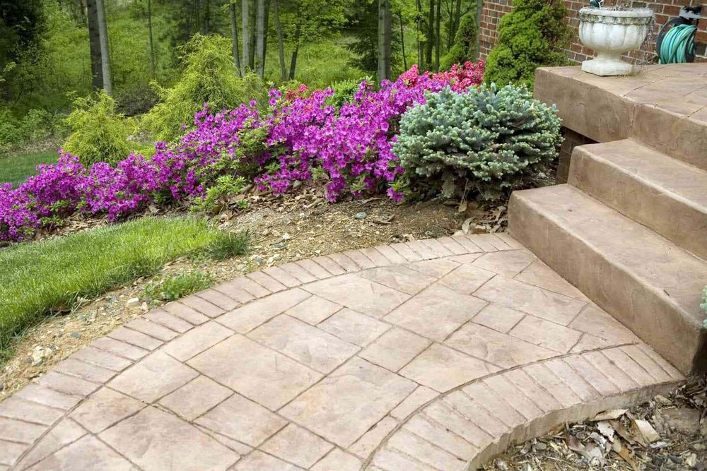 Enhance your outdoor living space with our stamped concrete installation service for deck & patio installation. Create a beautiful, durable, and customized surface that adds value to your property. for Almighty Home Improvement Group in Old Westbury, NY