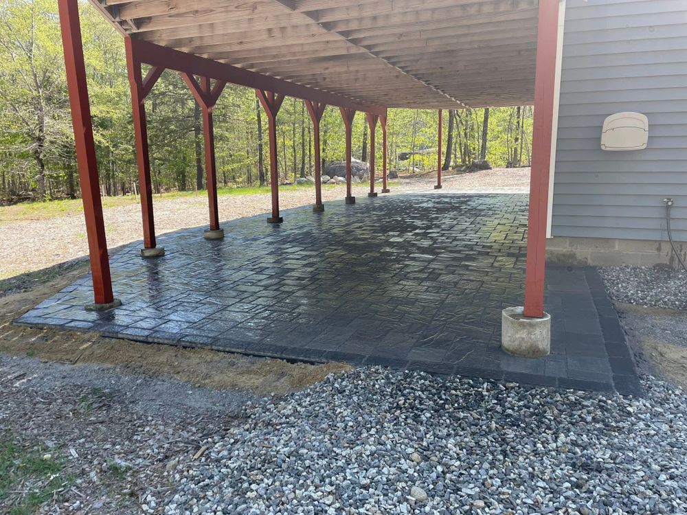 Transform your outdoor space with our expert Patio Design & Construction services. Enhance your home's beauty and functionality through custom masonry solutions tailored to suit your style and budget. for Smythe’s Stonework & Masonry in Buxton, ME