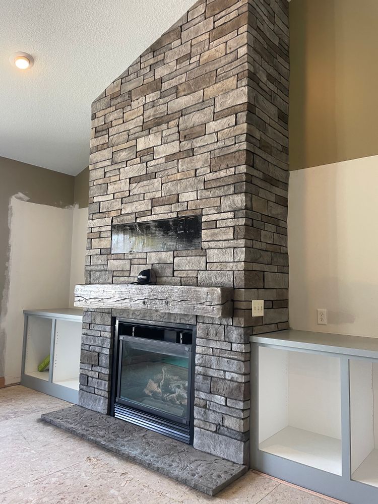 Interior fireplace & feature walls  for STAMPEDE Vertical Concrete in Isanti, Minnesota