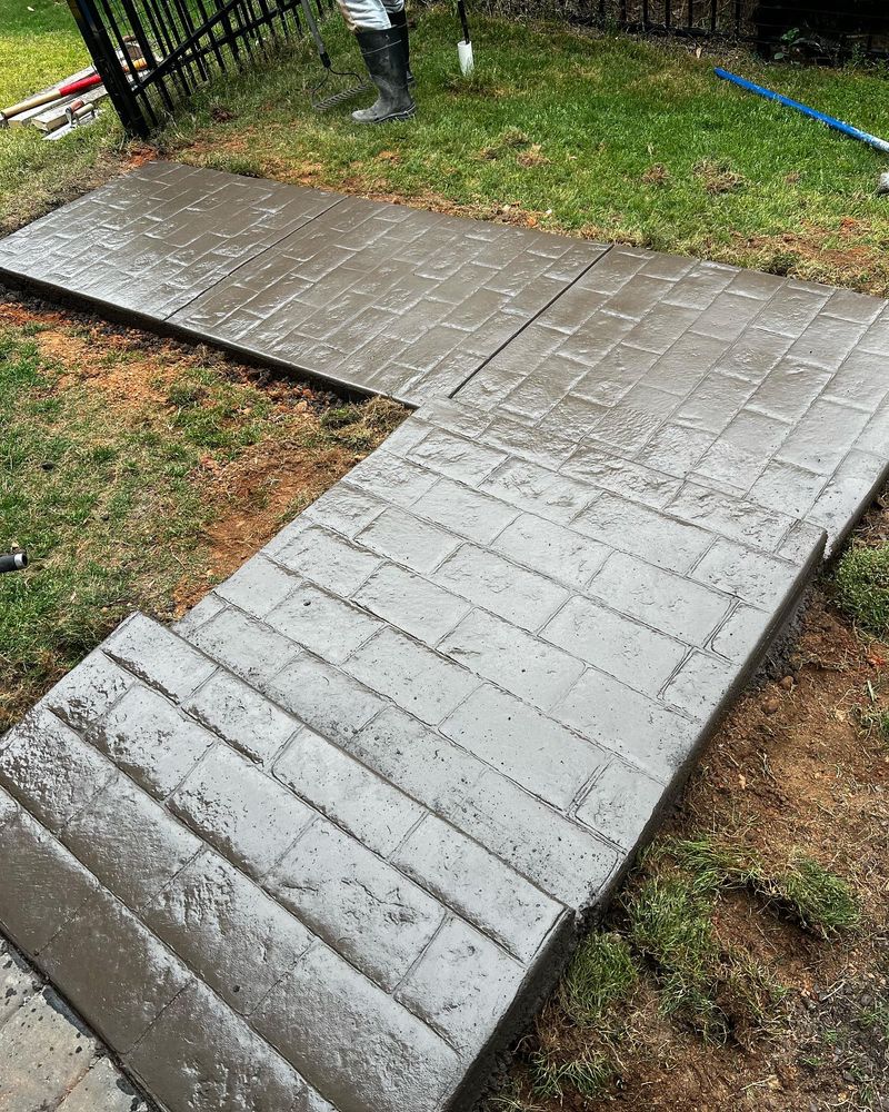 Our Stair Design & Installation service offers homeowners beautifully crafted, durable concrete stairs tailored to enhance your home's aesthetic and functionality. Trust our expert team for precision, quality craftsmanship, and timely delivery. for Allen's Concrete Finishing in Rock Hill, SC