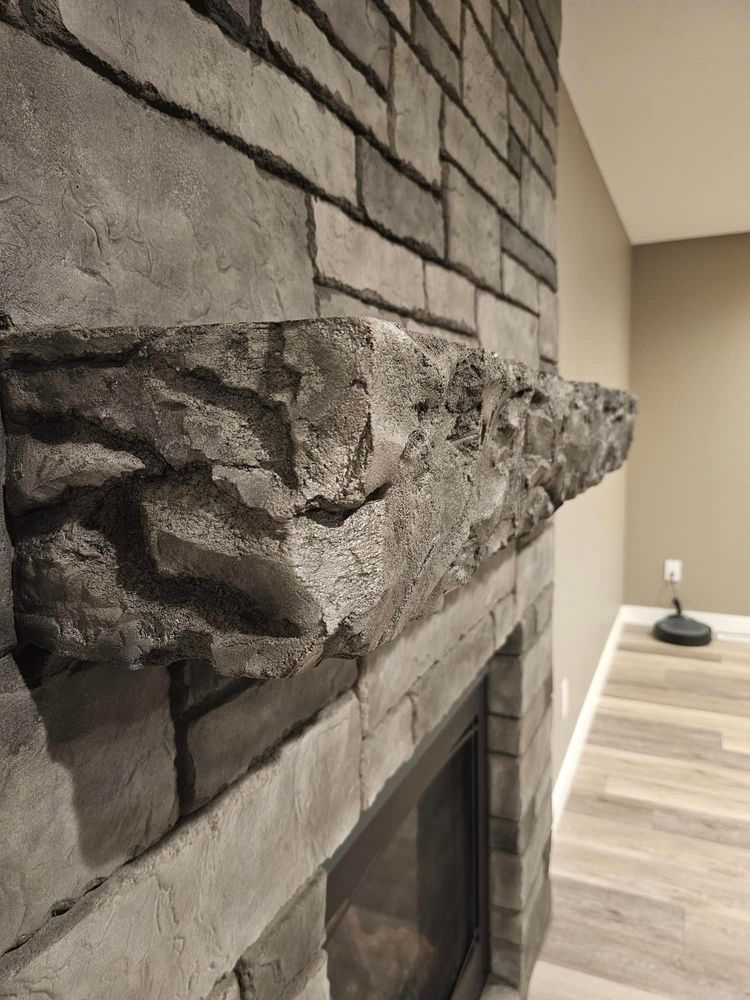 Interior fireplace & feature walls  for STAMPEDE Vertical Concrete in Isanti, Minnesota