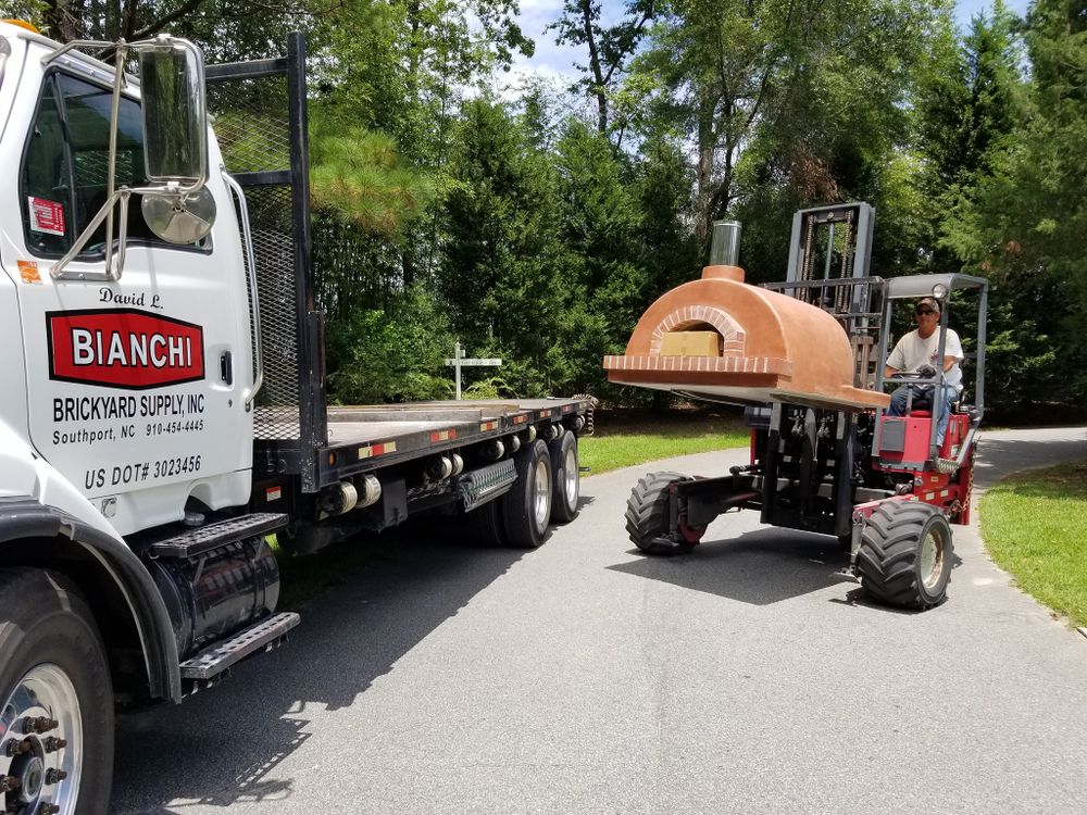 Our Landscaping company offers reliable delivery services, ensuring prompt and careful transportation of all materials, plants, and equipment directly to your home for a seamless landscaping experience. for Bianchi Business Development in Southport, NC