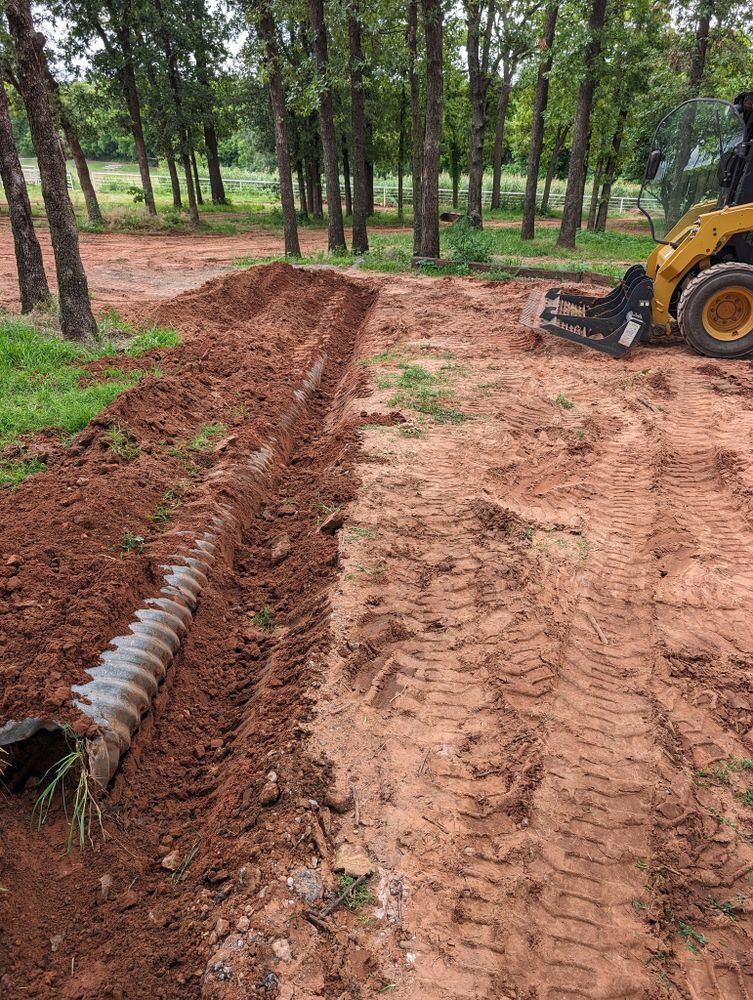 Our Sewer & Water Lines service ensures reliable installation and repair, using advanced techniques to maintain seamless water flow and prevent costly plumbing issues for your home’s safety and efficiency. for Nathan Foyil Bobcat Work in Guthrie, OK