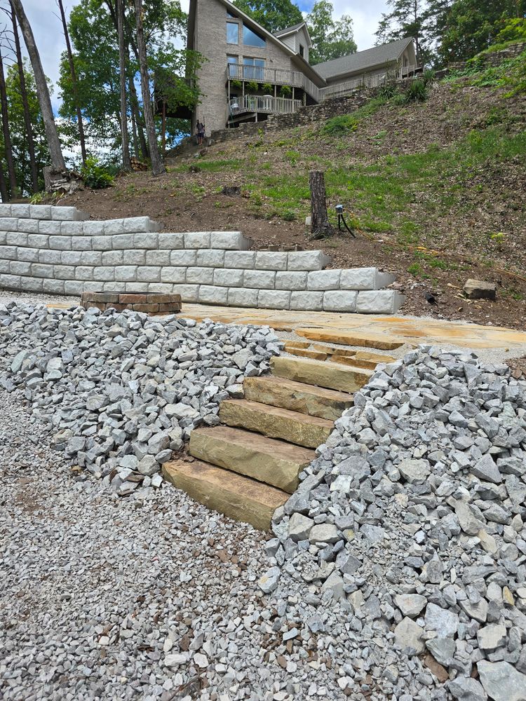 Enhance your landscape with our expert retaining wall services, designed to prevent soil erosion, improve drainage, and create beautiful terraced areas that seamlessly integrate into your outdoor space. for Williams Lawn and Land in Sharps Chapel, TN