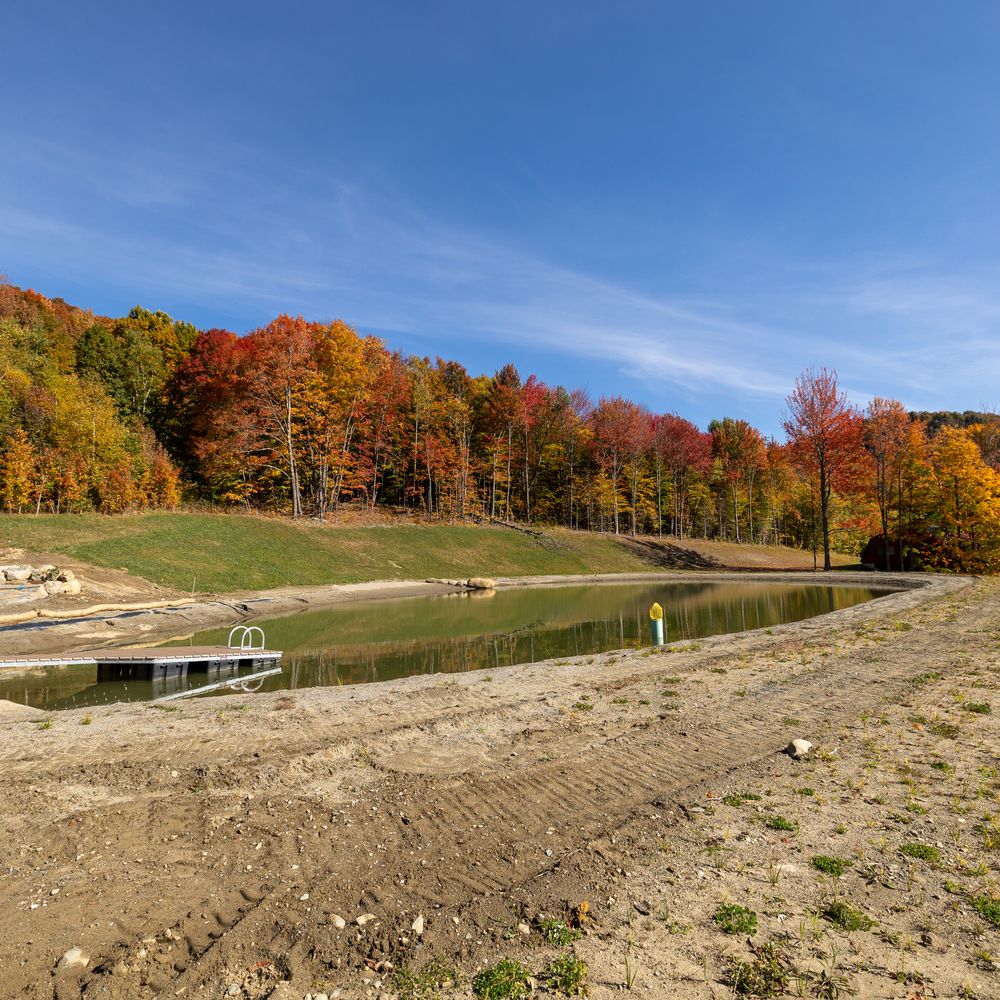 Carving a Pond into a Mountain Side for Andy Naylor Excavation in Stowe, VT