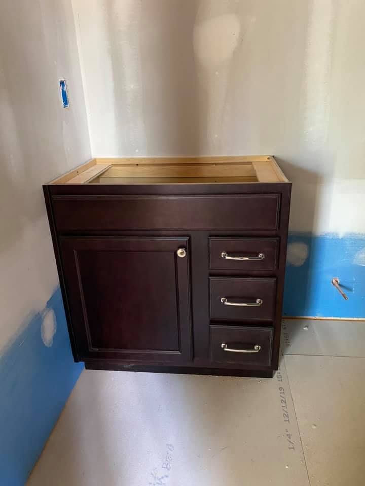 Upgrade your kitchen cabinets with our professional staining service. Revitalize the look of your space with a wide range of stain options to enhance the beauty and durability of your cabinetry. for Prime Source Cabinetry in Clayton, NC