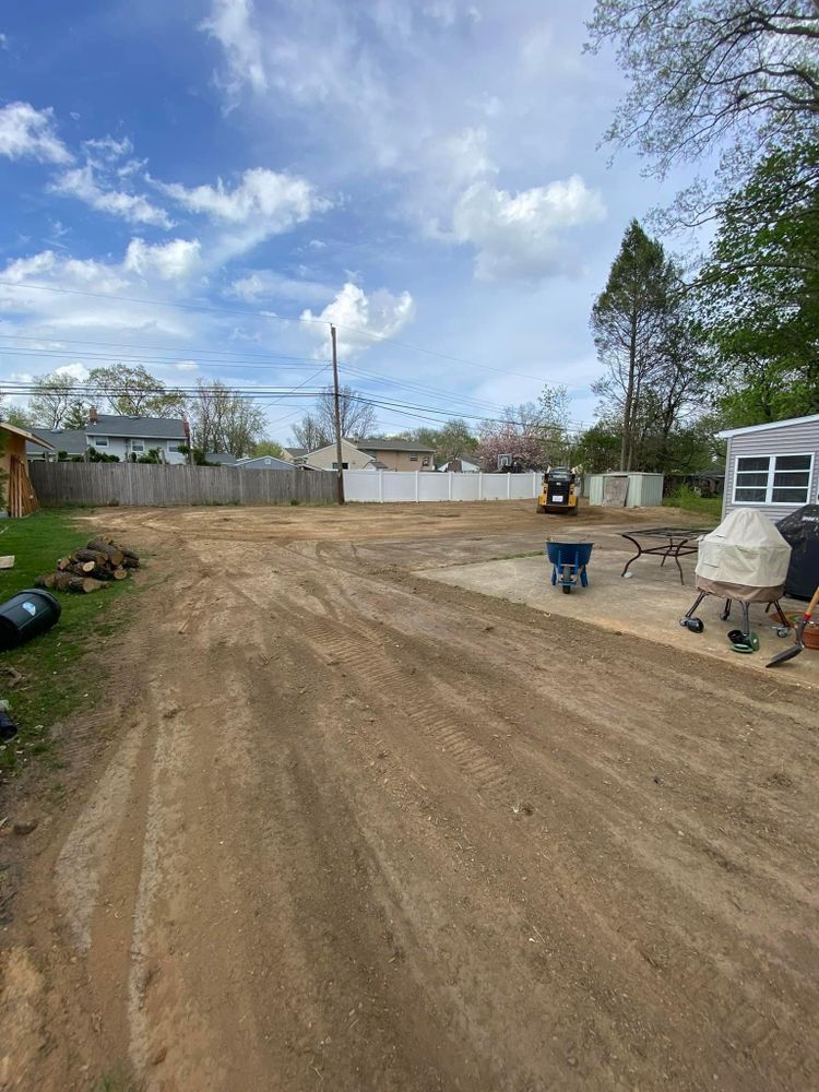 Our Land Grading service ensures a solid foundation for your outdoor projects, efficiently leveling and contouring your land to prevent drainage issues and create aesthetically pleasing, functional landscapes. for Russo’s Landscaping & Tree Removal in Levittown, PA