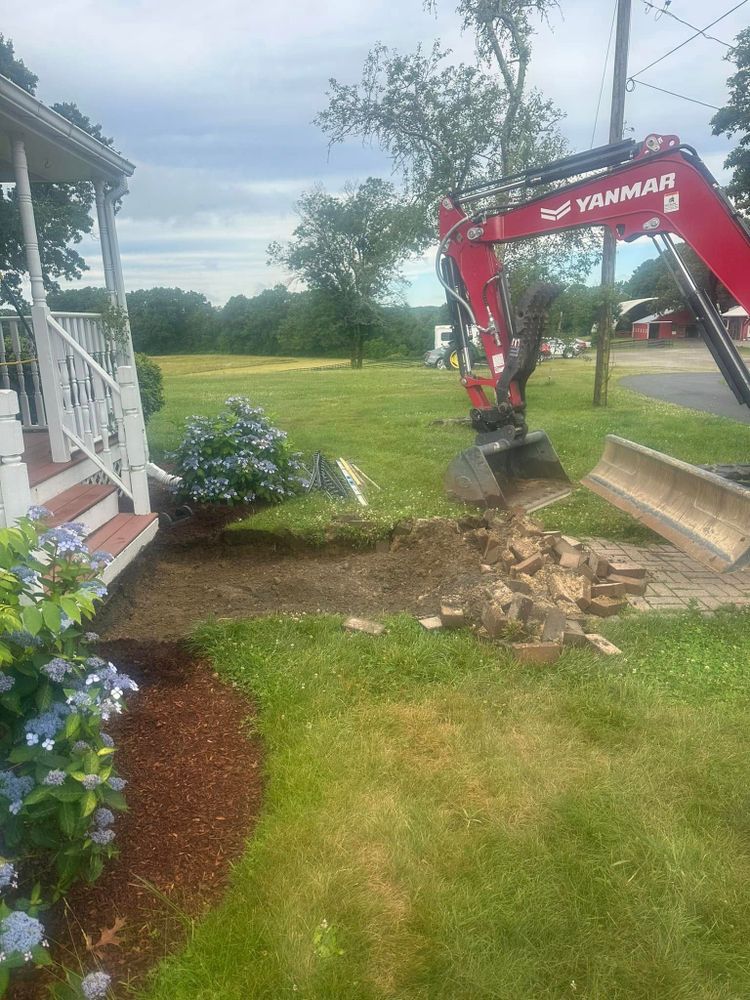 Our Land Clearing & Demolition service efficiently prepares your site for new projects, ensuring safe and thorough removal of debris, trees, and structures to create a clean slate for construction. for E. Gordon Construction in Dighton, MA