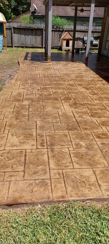 Elevate the aesthetics of your outdoor living space with our Stamped Concrete service, offering a wide range of customizable patterns and colors to create beautiful and durable surfaces for your home. for Slabs on Grade - Concrete Specialist in Spring, TX