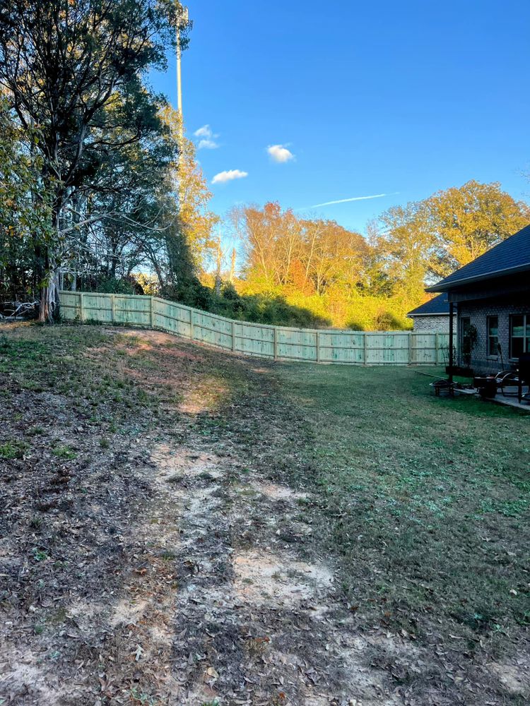 Enhance your property's security and aesthetics with our professional fence installation service, offering expert craftsmanship, durable materials, and personalized designs to complement any home's style while ensuring privacy and safety. for True Fencing Company in Forsyth, GA