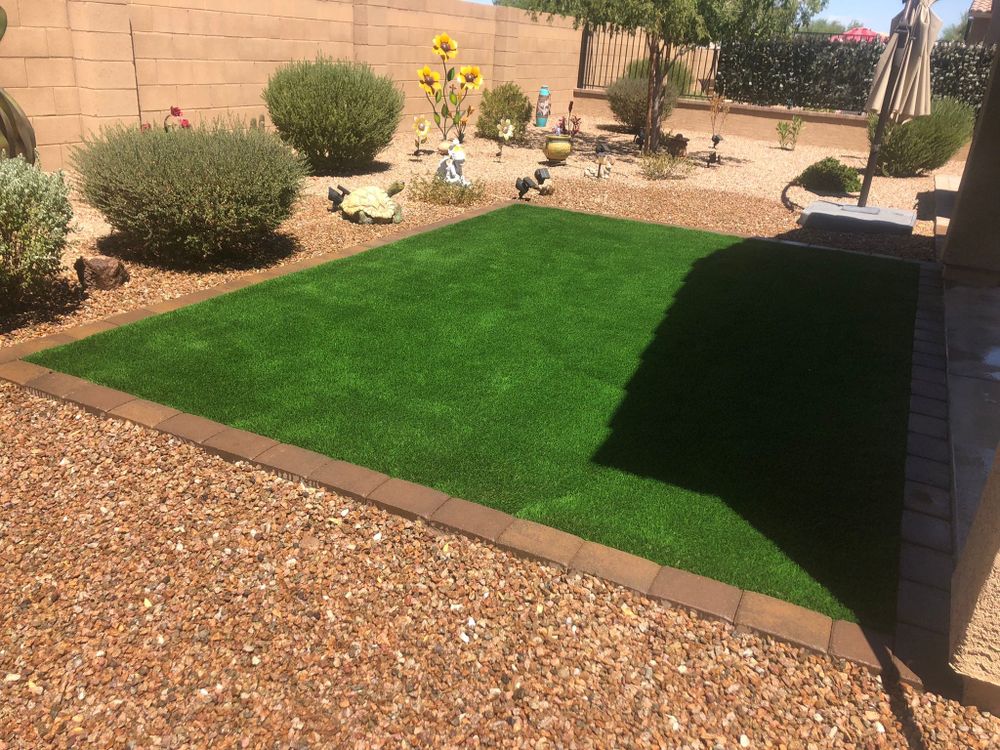 Transform your outdoor space with our Residential Artificial Turf Installation. Enjoy a lush, low-maintenance lawn all year round, perfect for family activities and enhancing your home's curb appeal. for Green landscape in Chandler, AZ
