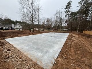 Discover what concrete can do for your home: our expert service transforms outdoor spaces with durable, aesthetically pleasing features, from patios to pathways, enhancing both beauty and functionality. for J&J Hauling and Outdoor in Fayetteville, GA