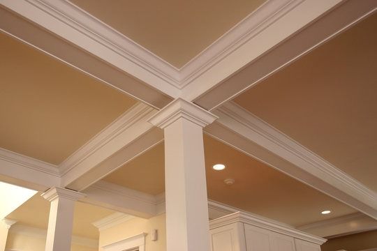 Enhance your home's elegance with our expert Crown Molding installation. Our skilled team delivers precise craftsmanship, seamlessly integrating beautiful moldings to complement and elevate the style of any room. for Cooper Painting in Edinburg, IL