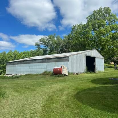 Discover our Quonset service, offering durable and weather-resistant solutions for additional storage or workspace. Perfectly customizable to meet your needs, enhancing both functionality and aesthetics for your home. for Jack Sherlock Painting in Grand Blanc, MI