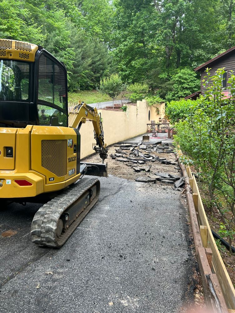 Our Concrete and Asphalt driveway removal service efficiently dismantles and removes old driveways, ensuring a clean site ready for new installation while prioritizing safety, speed, and minimal disruption to your property. for The Gravel Guy in Blairsville, GA