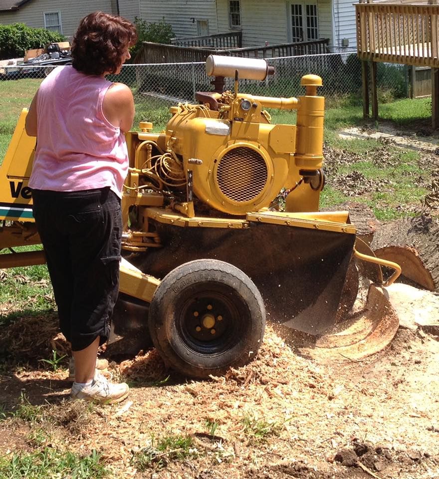 Our Stump Removal service efficiently removes unsightly tree stumps, enhancing your landscape's beauty and safety. Using advanced equipment, we ensure complete removal, preventing future growth and making your yard pristine again. for M & J Tree Service & Stump Grinding in Auburn, GA