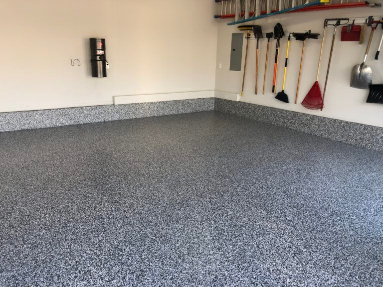 Our Garage Floor Epoxy service offers durable and long-lasting protection for your garage floor, enhancing its appearance and increasing its resistance to damage from chemicals, oil, and wear. for RJL Painting & Pressure Washing LLC in Charleston, SC