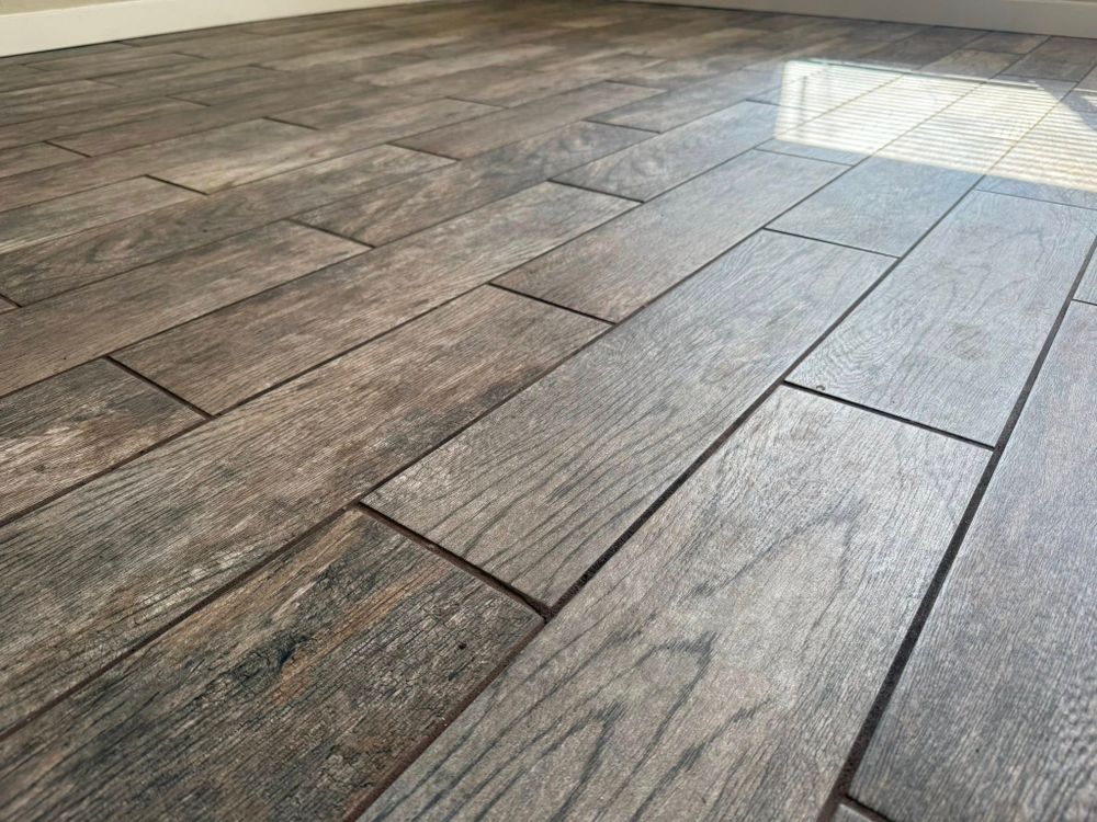 Transform your home with our expert flooring services! We offer a wide selection of durable and stylish options, ensuring high-quality installation that enhances your space's beauty and functionality. for Vazquez & Son's Renovations LLC in Tucson, AZ