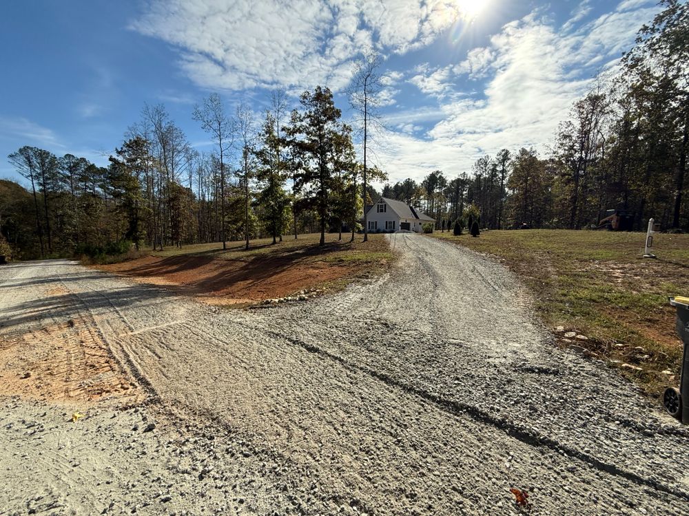 Gravel driveways are a durable, affordable option for any property. Expert installation and refreshing services can restore old gravel to like-new condition or create a brand-new driveway, offering cost savings and long-lasting quality. for Dirt Pro Land Solutions in Fayetteville, GA