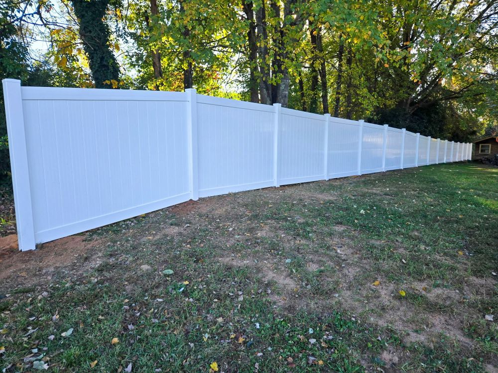 Enhance your property's security and aesthetics with our professional fence installation service, offering durable materials and expert craftsmanship tailored to meet your specific needs for beauty and protection. for PRO-Vision Fence Company LLC in Lenoir County, NC