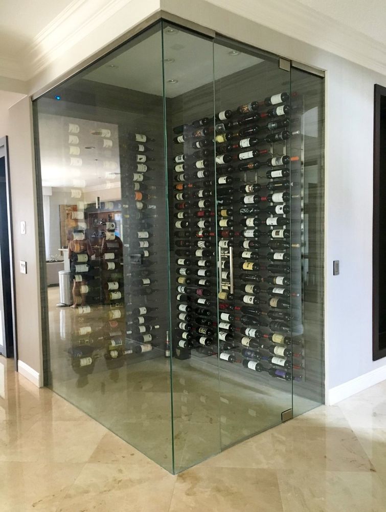 Showcase your collection with a custom glass wine room that combines timeless minimalism, secure storage, and stunning visual impact. Designed for residential and commercial spaces, our glass wine cellars are built to match your style, layout, and wine storage needs. for Max Glass & Mirrors in Sunrise, FL