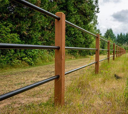 Enhance your home's security and aesthetics with our durable metal pipe fences, expertly crafted for strength and style. Trust our Construction & Remodeling team to deliver quality installations tailored to your needs. for Champs Fencing in Dallas, TX