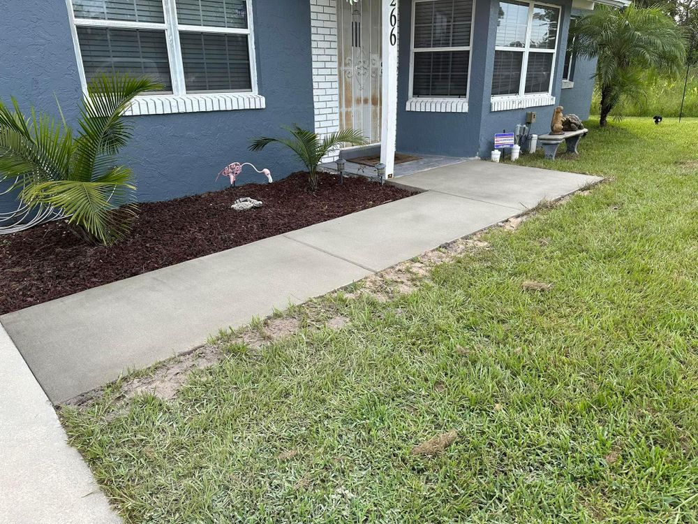 Our Sidewalks and Walkway Construction service offers expert concrete installation, providing homeowners and businesses with safe and durable pathways that enhance the aesthetics and functionality of their property. for Green Hammer Concrete in Palm Bay, Florida