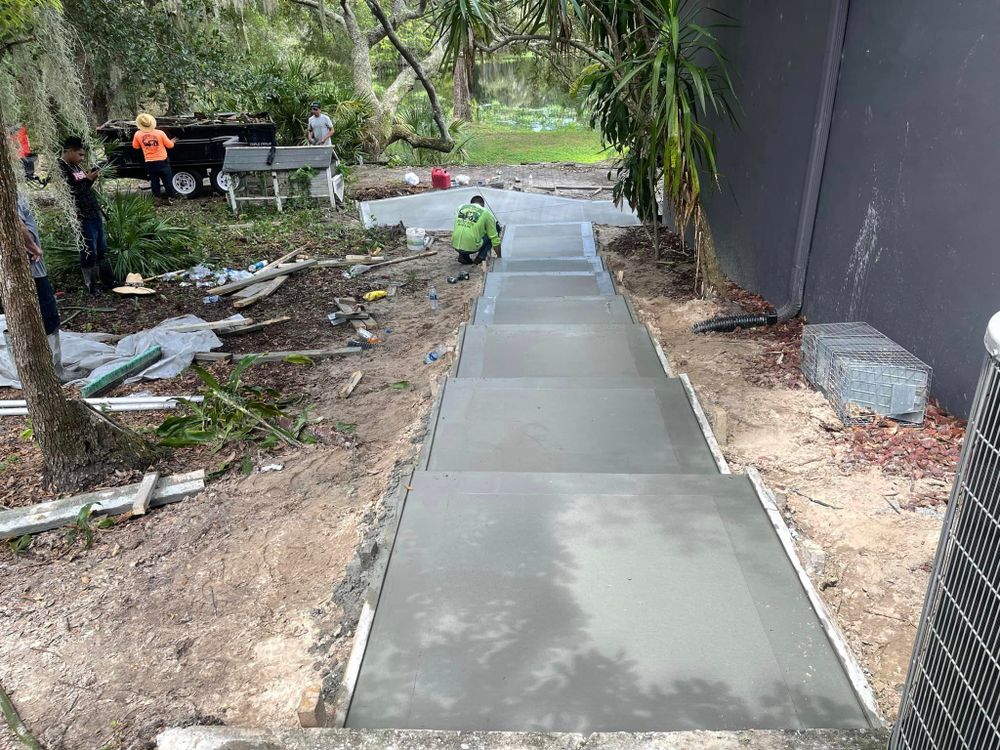 Our Stair Design & Installation service offers homeowners the opportunity to enhance their property with durable and visually appealing concrete stairs tailored to fit their unique aesthetic preferences and structural needs. for Florida Universal Concrete in Lakeland, FL