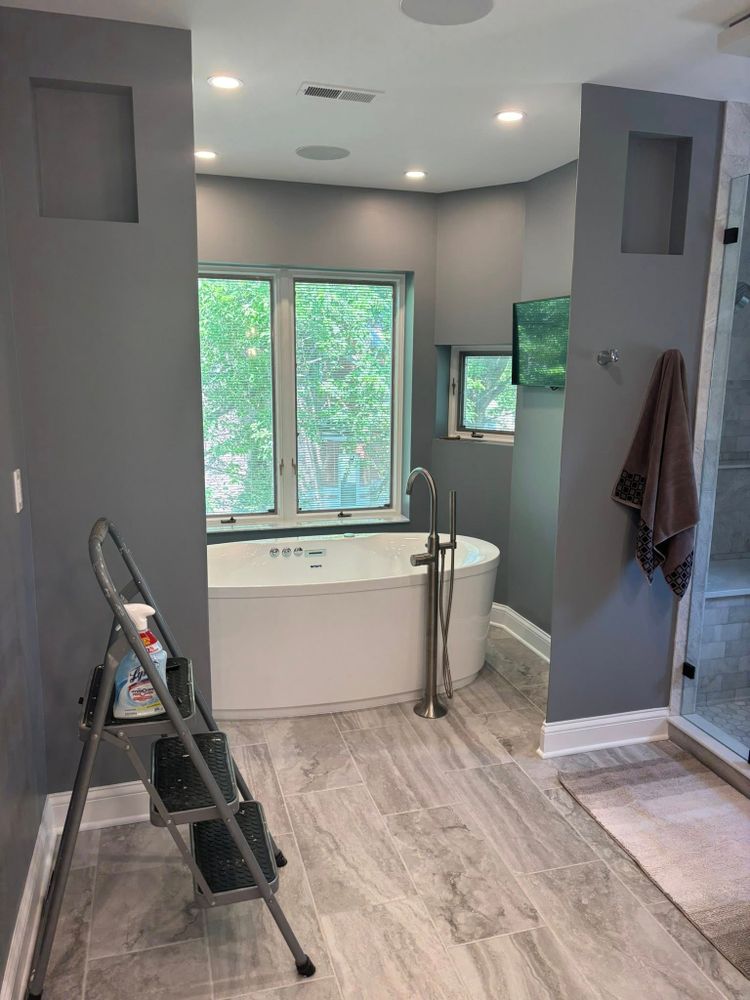 Transform your bathroom into a modern sanctuary with our expert renovation service. We offer customized designs, quality materials, and skilled craftsmanship to elevate both style and functionality in your home. for Linsfort Construction in Villa Park, IL