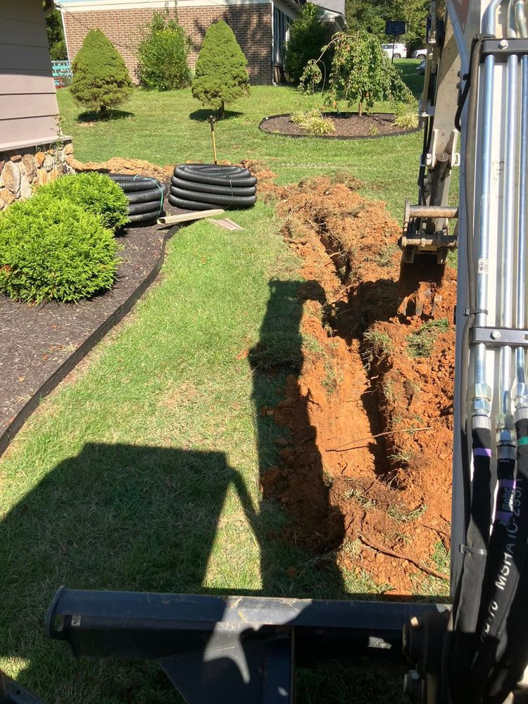 Our trenching service provides efficient and precise excavation for utility installations, drainage systems, or landscaping needs, ensuring minimal disruption to your property while enhancing structural and functional reliability. for Genesis Landworks in Bluff City, TN