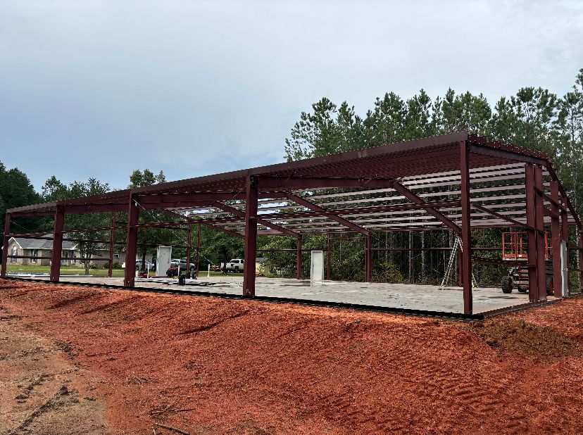 Our steel building construction service offers homeowners durable and customizable structures for additional storage, living space, or workshops with efficiency and longevity as top priorities in the design process. for Rolin Brothers Services in Frisco City,, AL