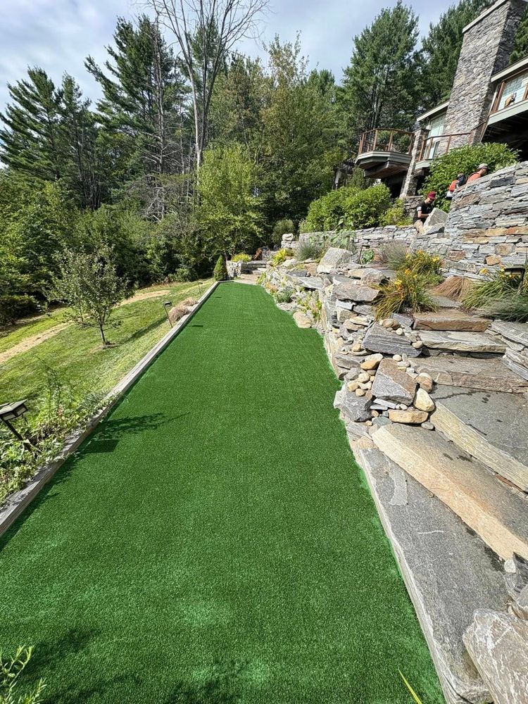 Our Turf Installation service expertly transforms your outdoor space with lush, durable grass. Pair it with our "Christmas lights installation near me" for a stunning, festive exterior this holiday season. for Thomas Clifford Property Services LLC in Enfield, NH