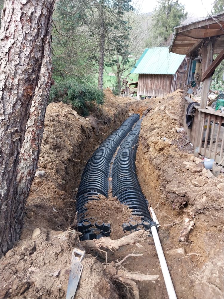 Our septic system repair service ensures optimal performance by providing expert solutions, including thorough septic tank draining to prevent backups and maintain a healthy, efficient home wastewater management system. for Quality Land Management and Septic Service in Green Mountain, NC
