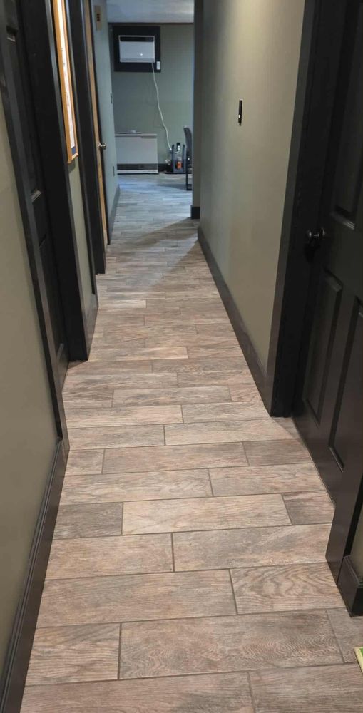Our expert team offers seamless floor installation, ensuring your hardwood floors are meticulously placed for durability and elegance, enhancing the beauty and value of your home with precision craftsmanship. for Durable Designs Flooring in Concord, NH