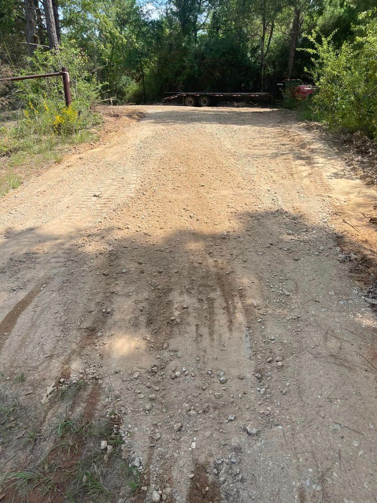 Our Driveway Construction service includes clearing and leveling land, laying a sturdy foundation, and surfacing with durable materials to create a smooth and long-lasting entrance for your home. for Randy Chumley Circle C Land Management in Marshall, TX