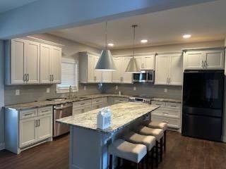 Transform the heart of your home with our Kitchen and Cabinet Refinishing service. Enhance the beauty and functionality of your space with a fresh new look that fits your style and budget. for M&M Painting T LLC in Charlotte, NC