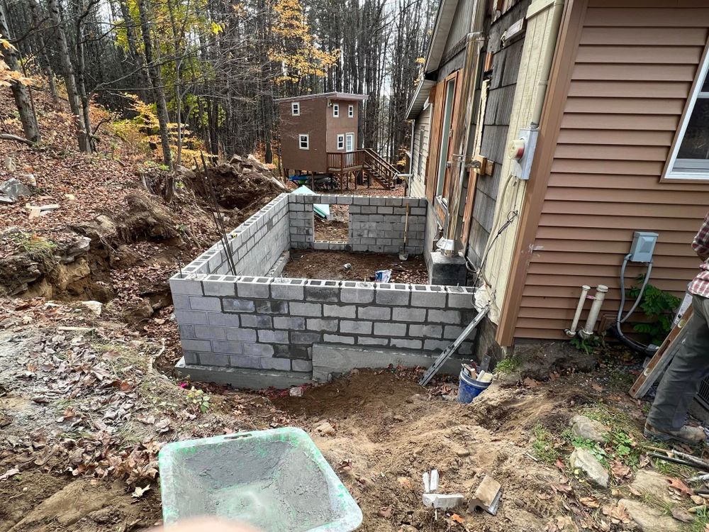 Our stone work service creates durable, attractive patios, walkways, borders, and masonry features using quality materials and expert craftsmanship, enhancing your home’s beauty, function, value, and long-term curb appeal. for Extreme Paving & Construction in Schenectady, NY