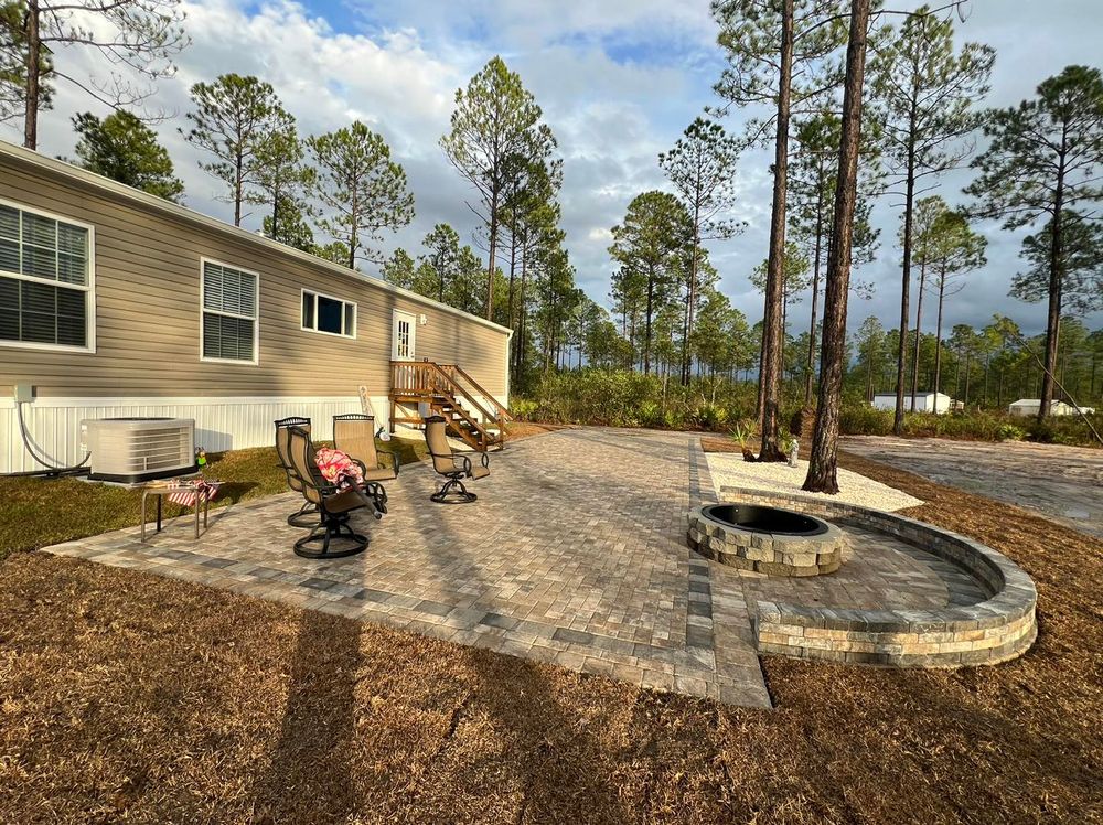 Enhance your outdoor living space with our expert patio and deck installation services. Discover seamless integration for year-round enjoyment. Also offering seasonal options like "christmas lights installation near me" to brighten holidays. for Santos Landscape in Waycross, GA