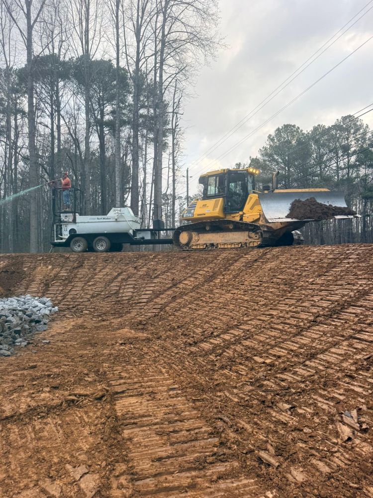 Our grading service reshapes your yard for proper drainage, stable landscaping, and safer hardscaping installation, preventing erosion and water issues while working carefully around obstacles like a tree stump. for J&J Hauling and Outdoor LLC  in Fayetteville, GA
