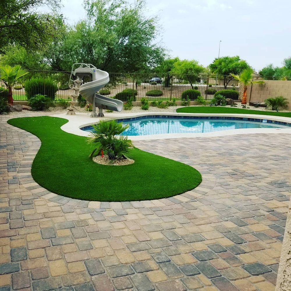 Enhance your outdoor space with our professional rock spreading service, offering precise placement and a polished finish that adds durability, beauty, and low-maintenance appeal to your landscaping or hardscaping project. for Kanelo's Hardscape and Landscape Services in Buckeye, AZ