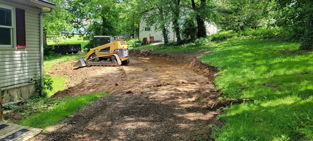 Our Residential & Commercial Excavation service efficiently prepares your property for landscaping projects. Discover the excavation meaning as we transform your outdoor space, ensuring a solid foundation for any landscape or hardscape design. for Admiring Landscapes in Lancaster, OH