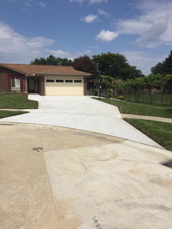 Our concrete services provide homeowners with durable, high-quality foundations, patios, and driveways. We ensure precision and reliability in every project to enhance the beauty and strength of your home’s exterior surfaces. for Deerbrook Construction in Pontiac, MI