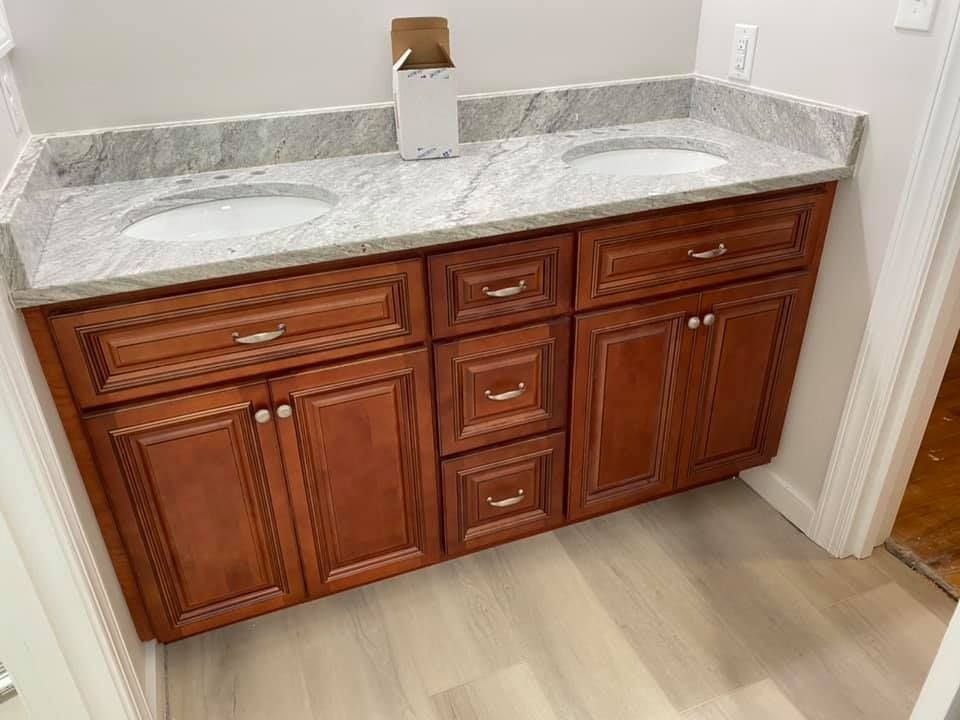 Our Custom Cabinet Design service offers homeowners the opportunity to collaborate with skilled craftsmen to create bespoke cabinets that perfectly fit their space, style, and functional needs. for Prime Source Cabinetry in Clayton, NC