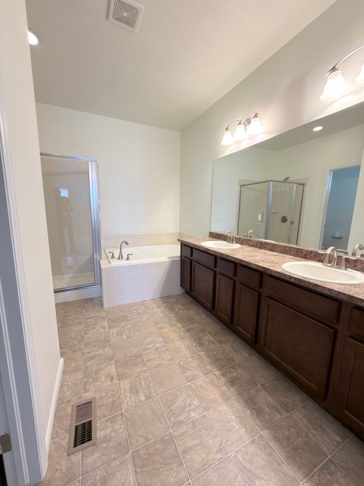 Transform your living space with our stunning tile flooring options that perfectly mimic the elegance of wood flooring, providing durability, easy maintenance, and a timeless aesthetic for your home. for Alpha Flooring & Painting Services. in Centennial, CO