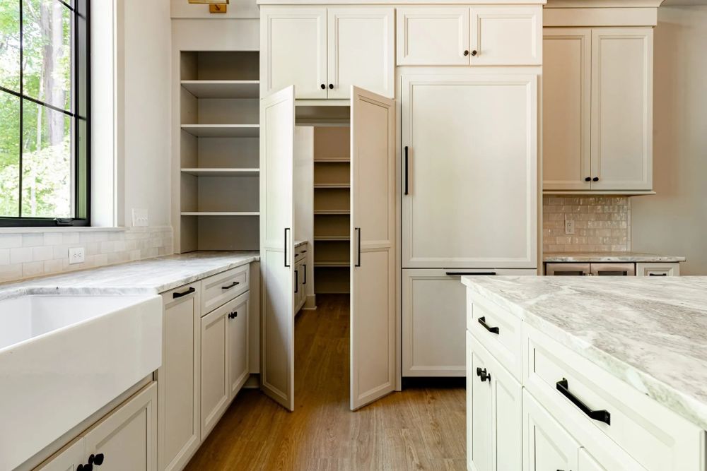 Transform your home with our Custom Cabinet Design service, where we craft uniquely tailored cabinets to fit your space perfectly, blending functionality with aesthetic appeal to enhance any room. for Vermont Carpentry and Handyman Services in Royalton, VT